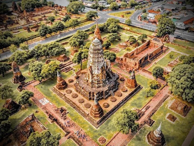 Ancient stone chedis and ruined temple columns at Ayutthaya Historical Park on a Bangkok Thailand tours UNESCO heritage day trip